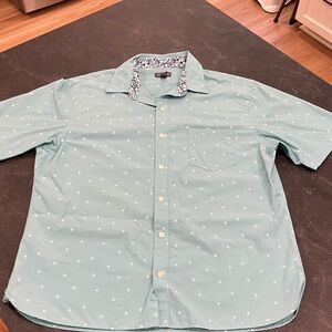 Light blue/teal men’s short sleeve casual beach button down with palm trees